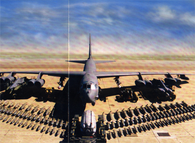 A scanned picture of a B-52 and its ordinance laid out in the desert
