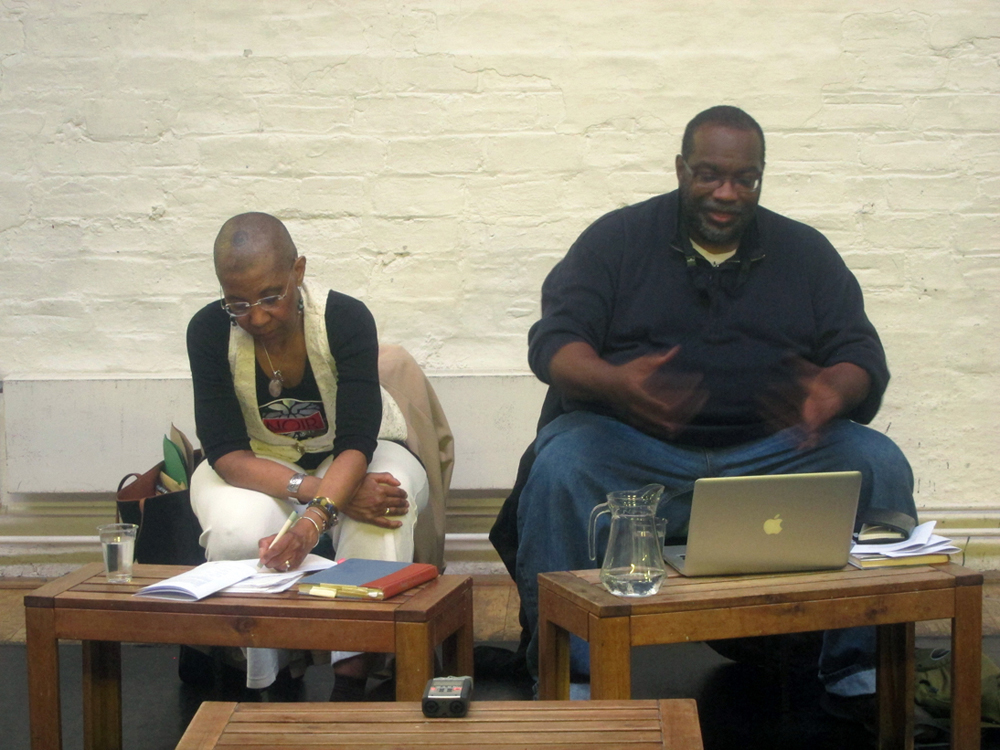 M. NourbSe Philips and Fred Moten sit next to each other during the talk