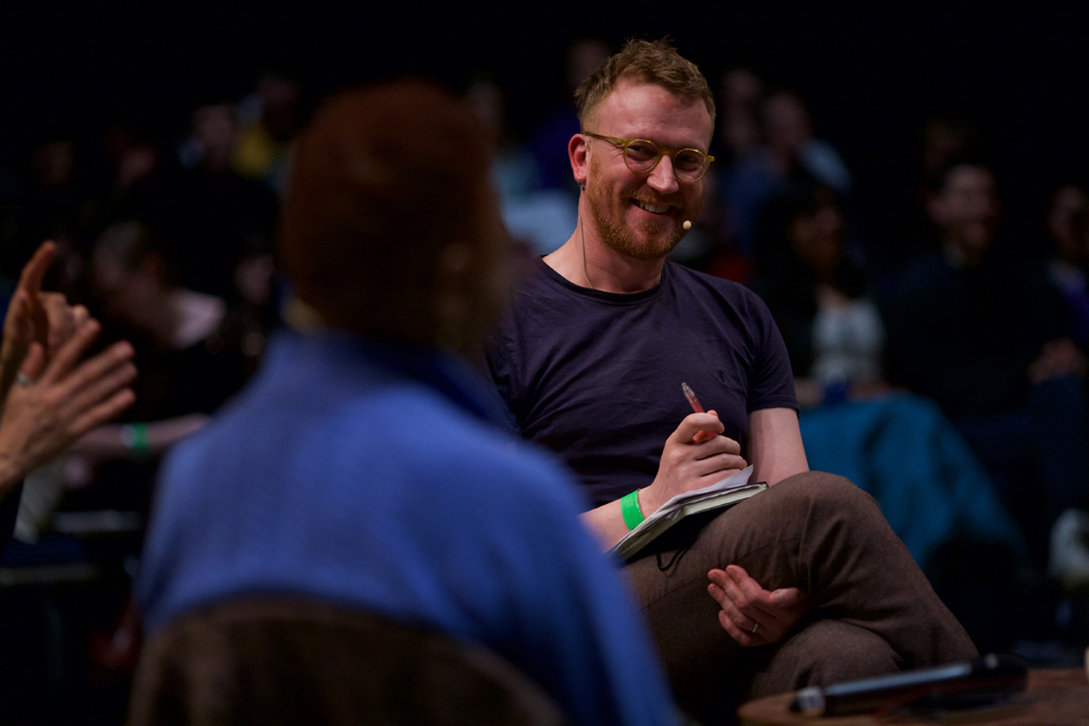 Barry Esson smiles at Hortense Spillers during the discussion