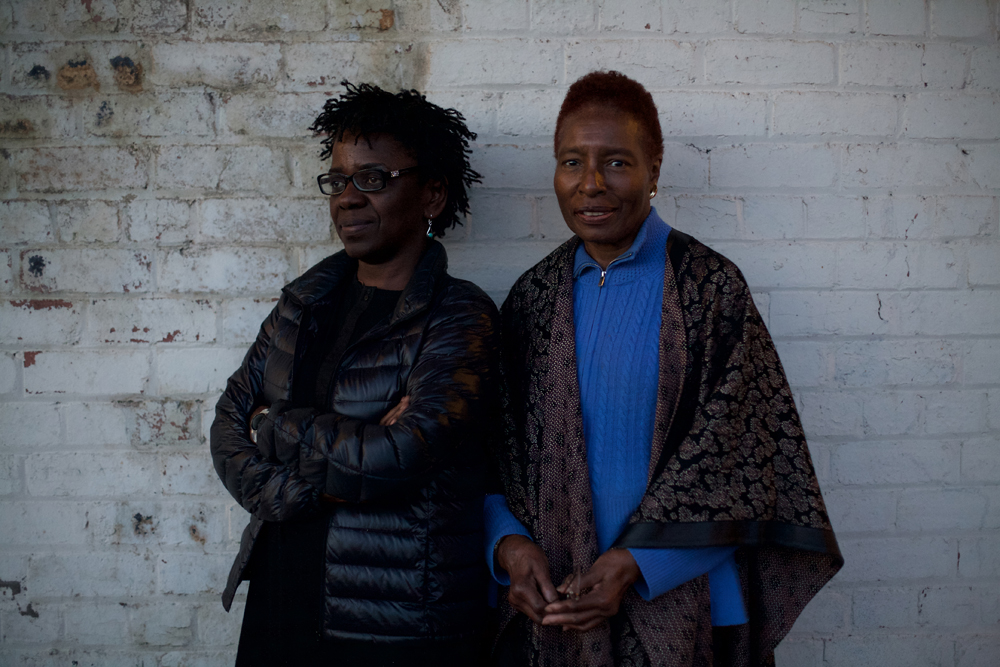 Hortense Spillers and Denise Ferreria Da Silva smile at camera during a portrait