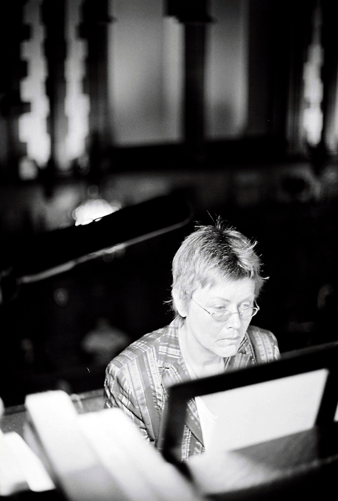 Eva Maria Houben looks at a score as she plays organ