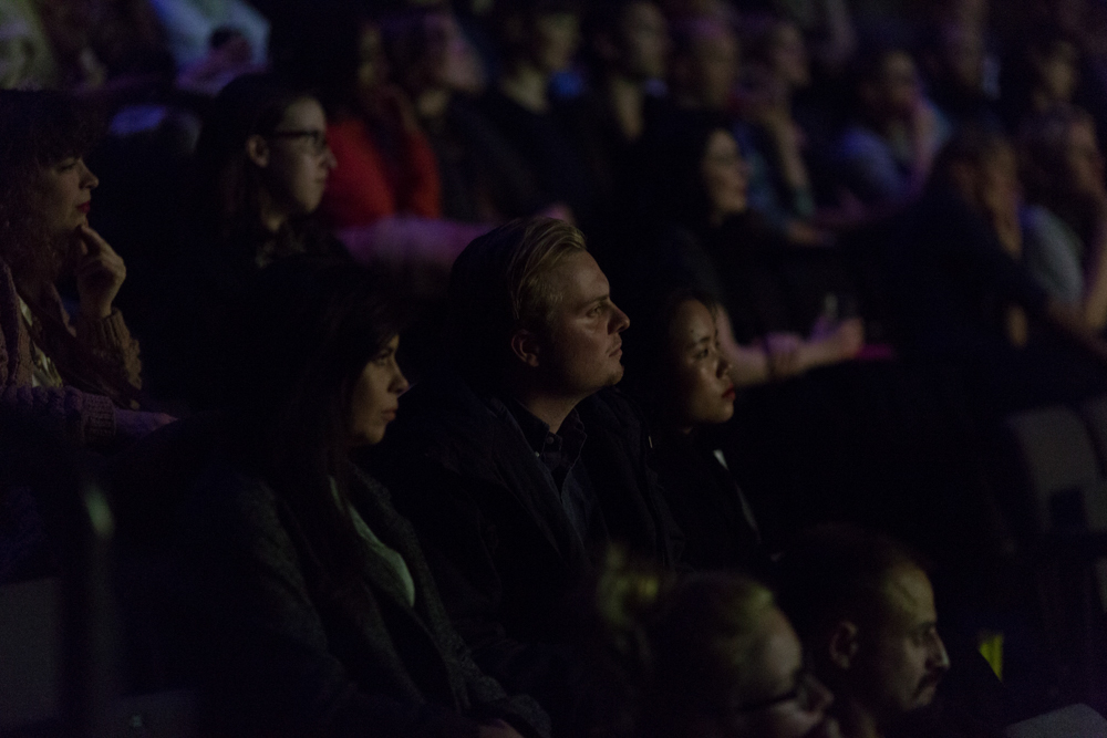 An audience watches the film Criminal Queers