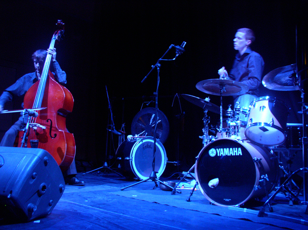 Richard Youngs playing a double bass Alex Neilson playing drums