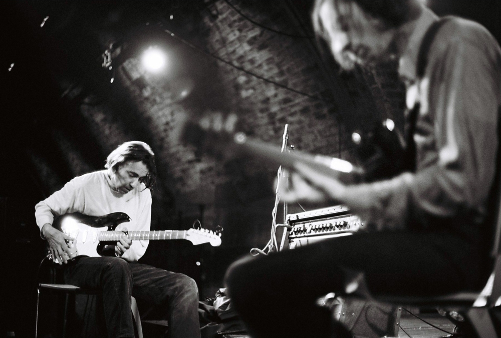 Loren and Alan playing electric guitars 