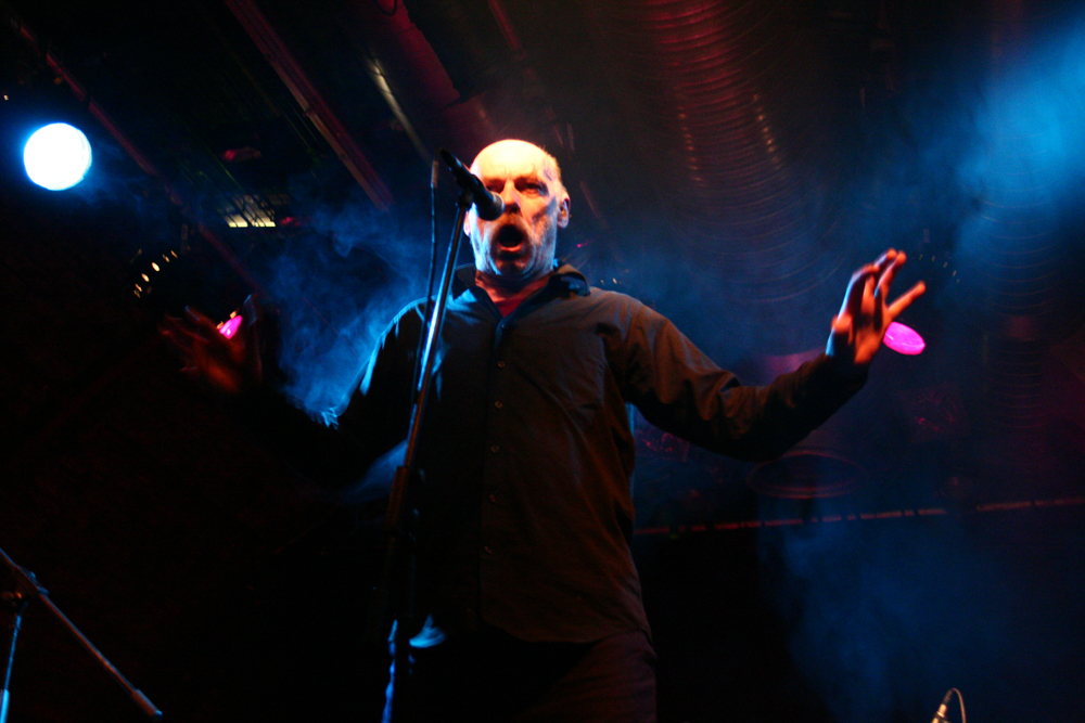 Ludo bellowing into a microphone at INSTAL 06