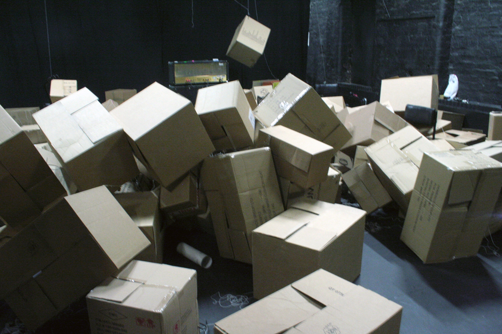 boxes and an amplifier in disarray