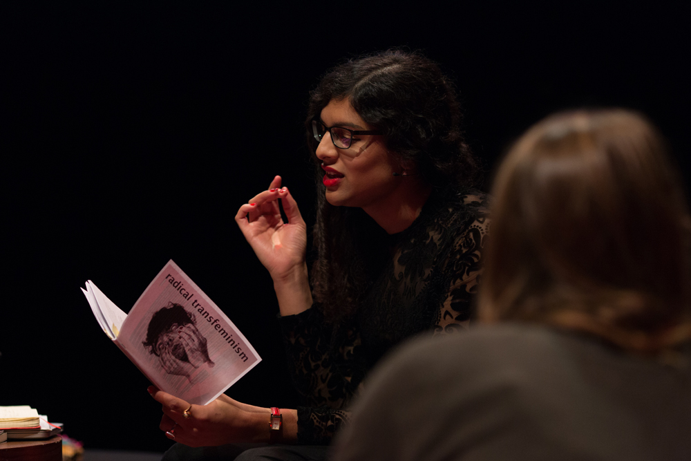 Nat Raha reading from a radical transfeminism booklet