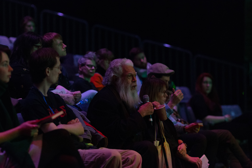 Samuel Delany talking from the audience during a discussion at EPISODE 9