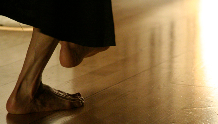 Yoko Muronoi's feet on a wooden floor at MLFC 