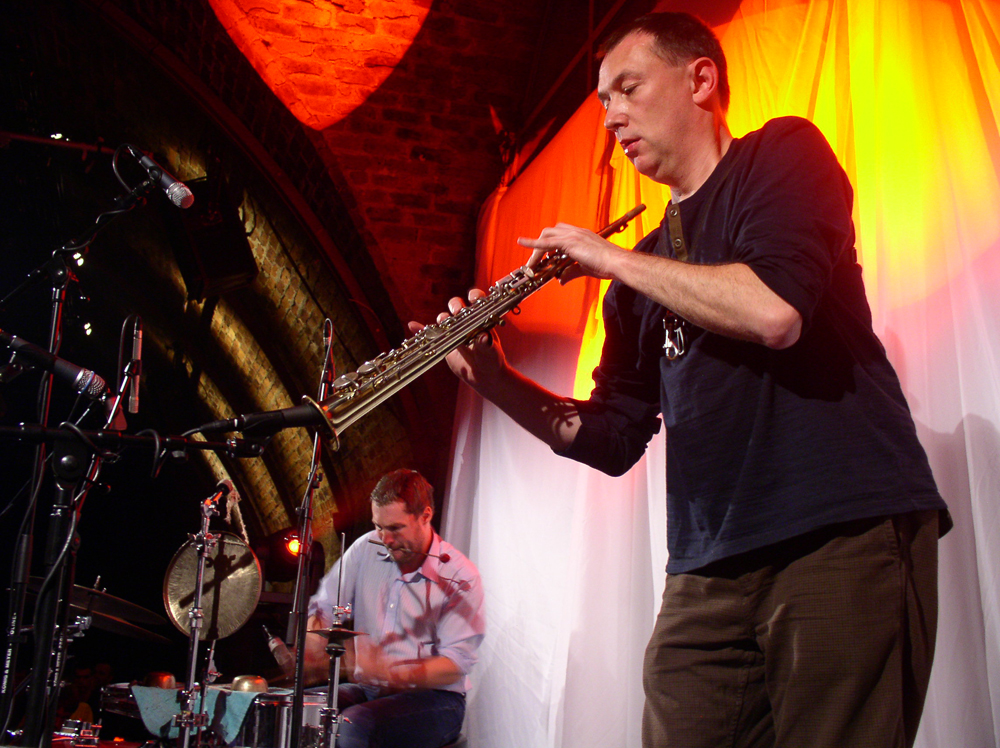 Ingar Zach & John Butcher playing drums and saxophone at INSTAL 04