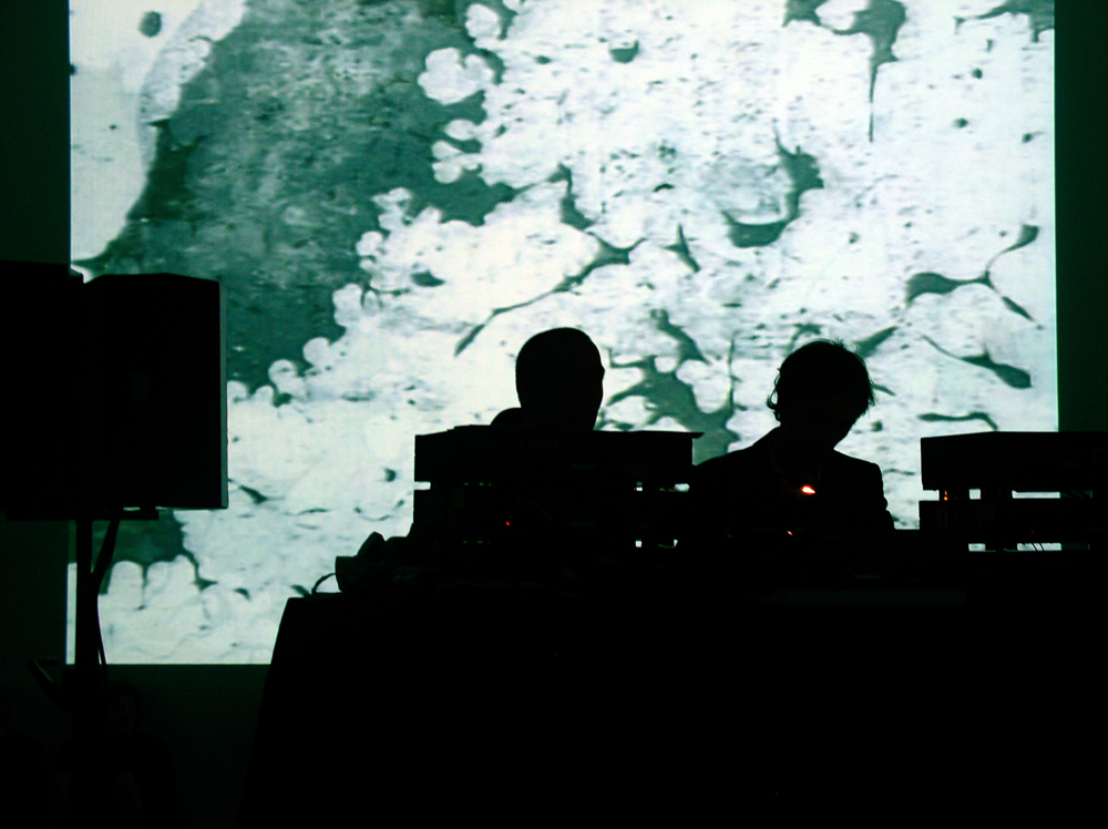 Mirror performing in front of a projection at KYTN 04