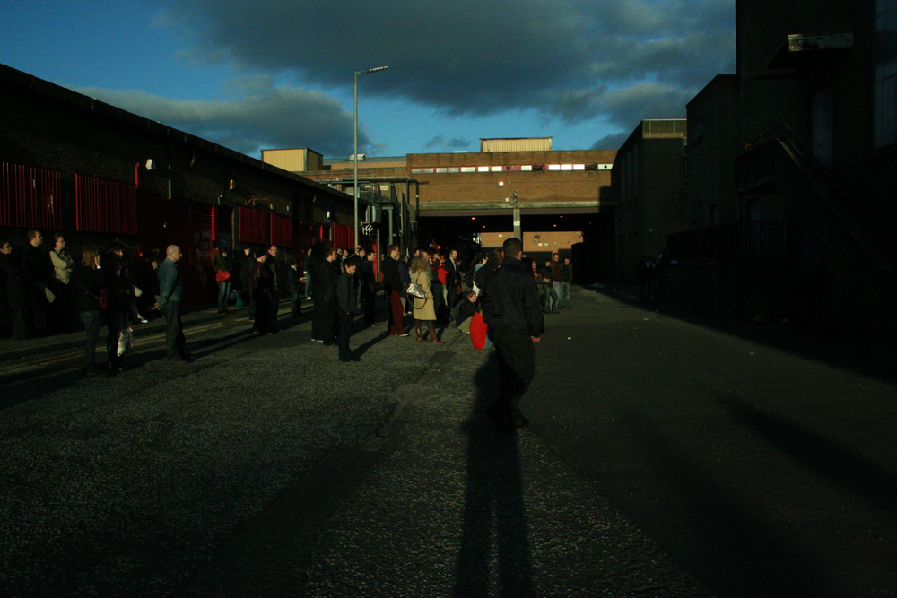Easterhouse in late evening with a departing audience