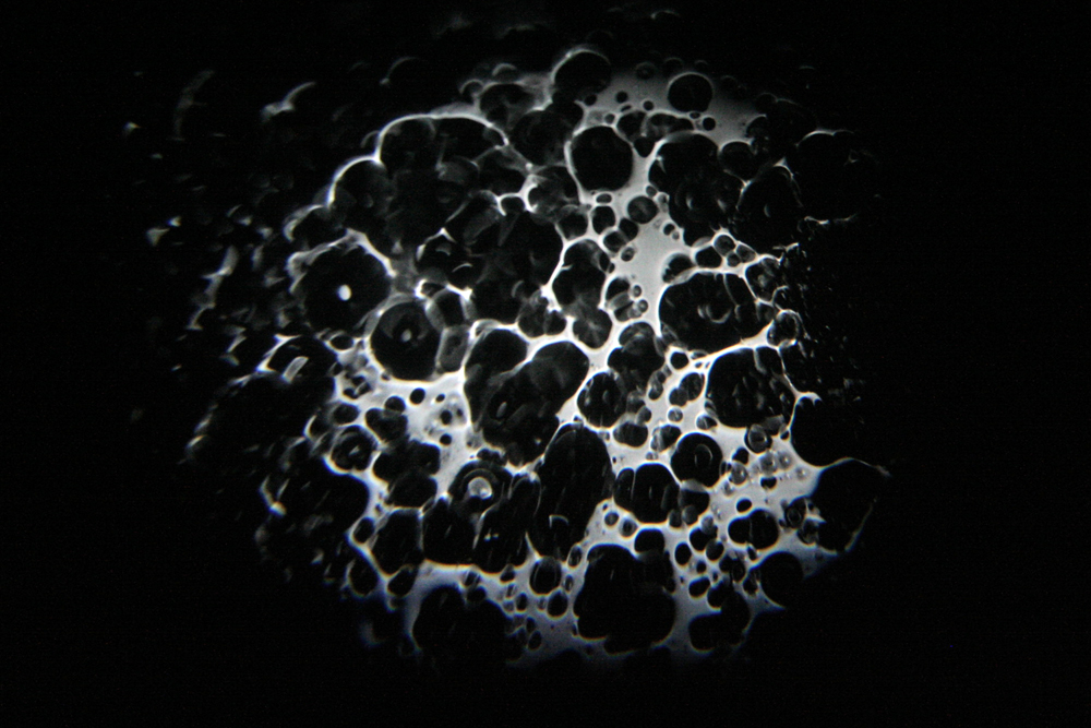 Metallic bubble forms on an IMAX screen