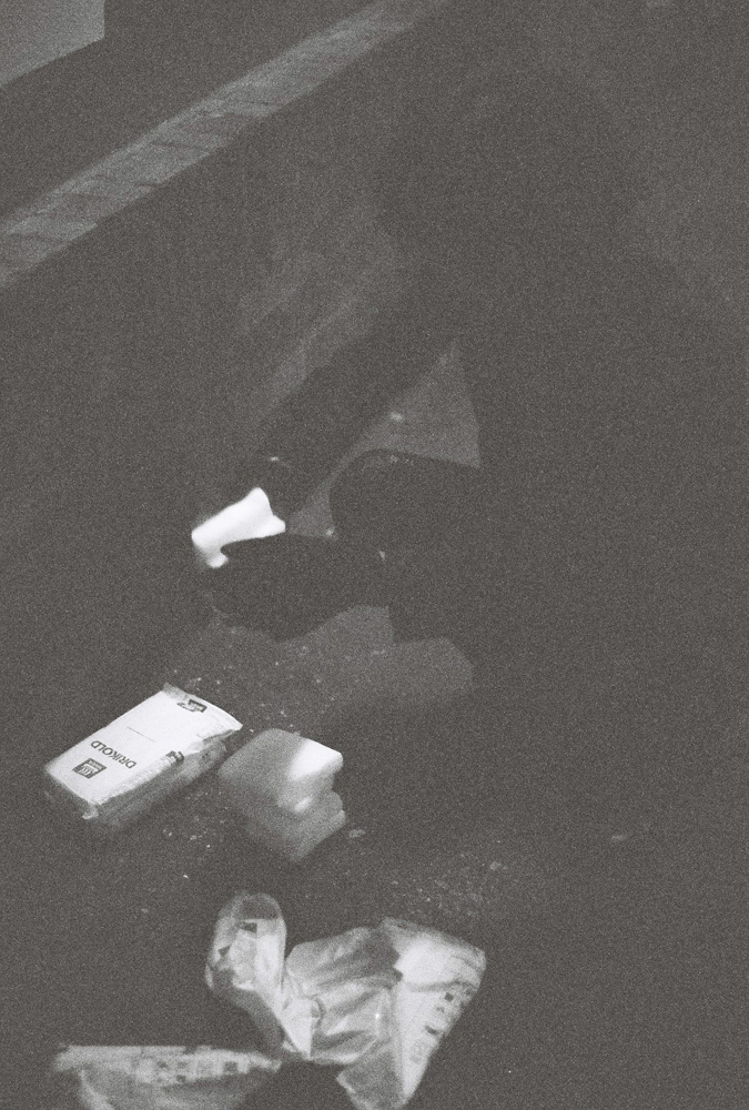 Unpacking dry ice on the floor of the Arches Theatre in the dark