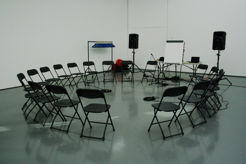 A circle of chairs in a room