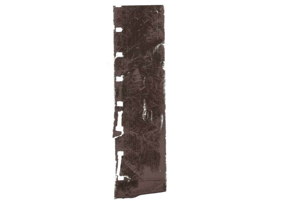 A section of exposed 16mm film stock covered in small abrasions