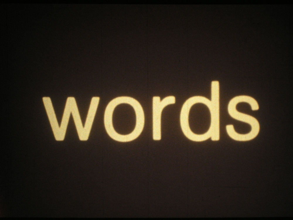 A black screen with the word, "words" written in large letters