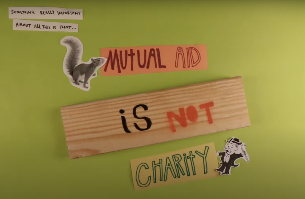 Still from animated film ‘shit’s totally fucked! What can we do? A mutual aid explainer’ – text and illustrations on paper and wood, that spells out “something really important about all this is that Mutual Aid is not Charity”