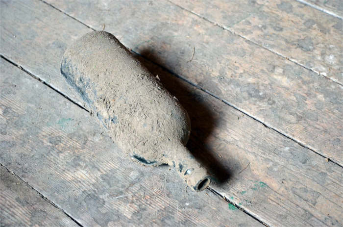 dust bottle on floor