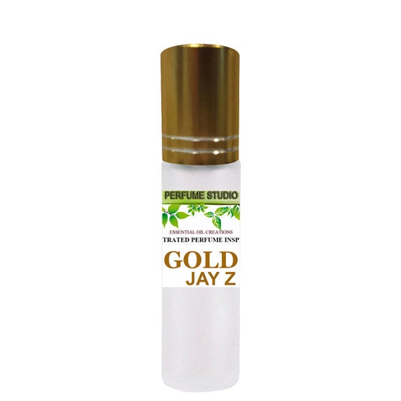Custom Blend Premium Perfume Oil. Similar Base Notes To Jz Gold Cologne For Men in A 10Ml White Frost Glass Roller Bottle With Gold Cap