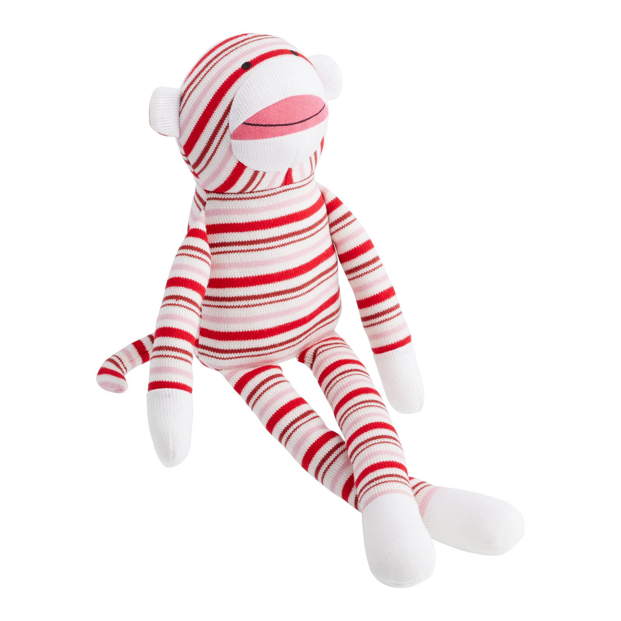 Pier Place Peppermint Striped Plush Stuffed Monkey: Red/White - Fabric by World Market