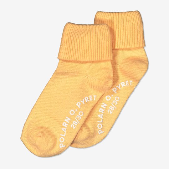 2-pakning sokker med sklisikring. gul