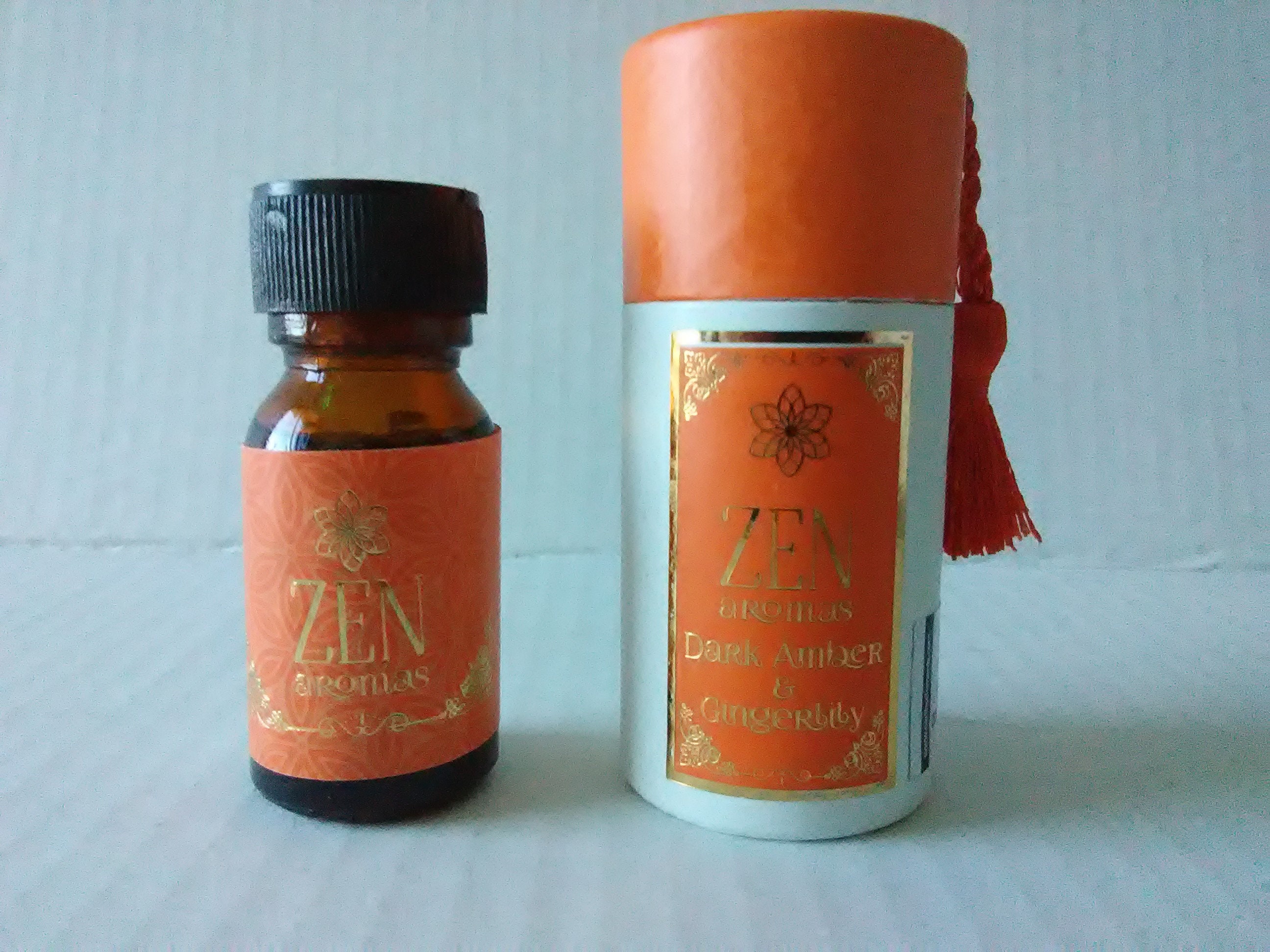 Zen Dark Amber & Ginger Lily Blend Of Essential Oils With An Orange Tassel Reusable Tube Usa - Aromatherapy
