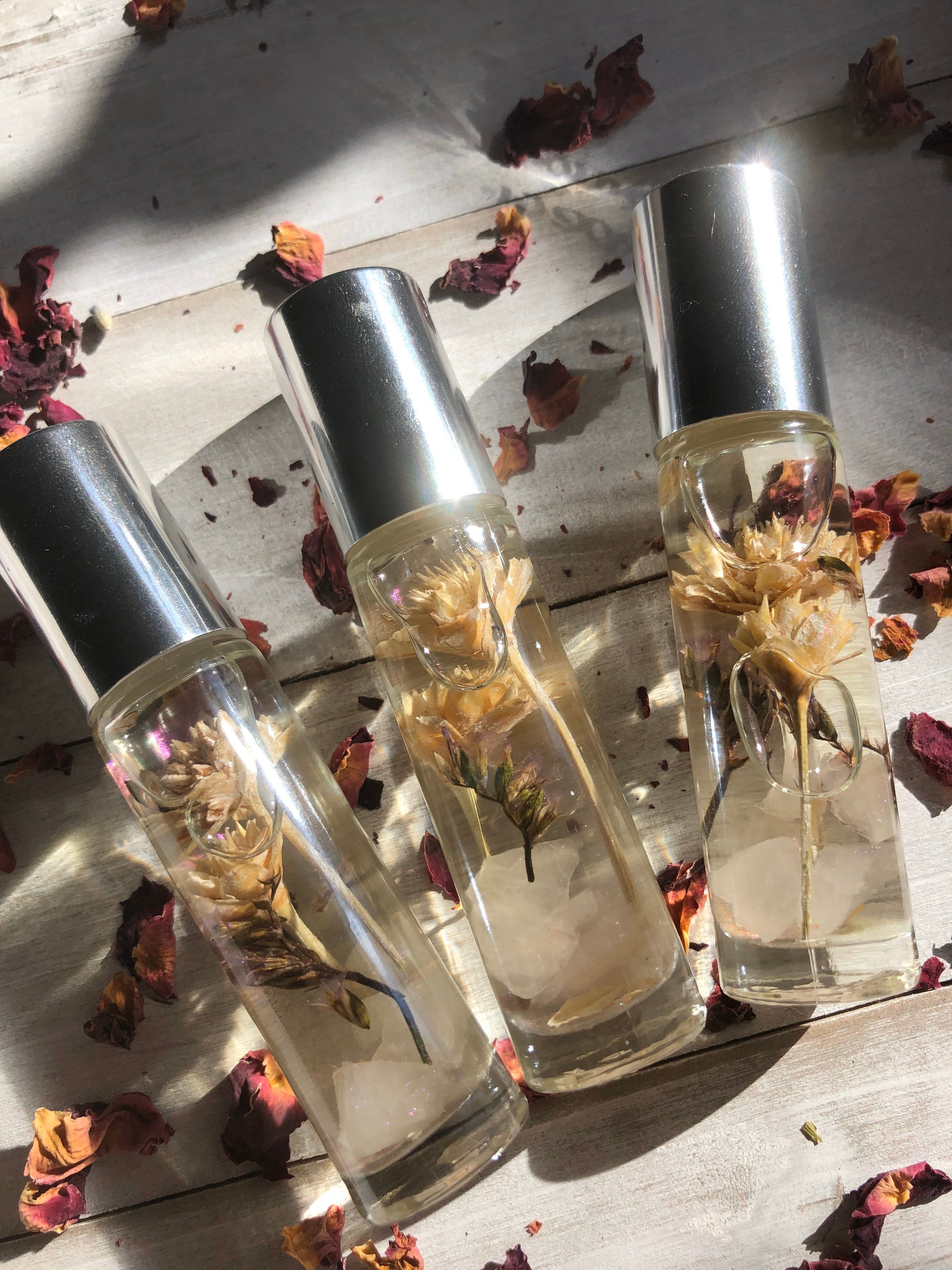 Aphrodites Spell Essential Oil Blend Made By Enlighten Clothing Co - Melanie Bodnar. Dried Flowers & Rose Quartz
