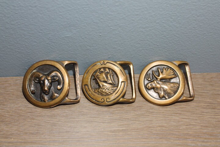 Vintage Tech Ether Guild, Inc. Solid Brass Belt Buckles 1978 Ram Big Horn, 1994 Ship "Glory Of The Seas", "Moose" Sold Individually"