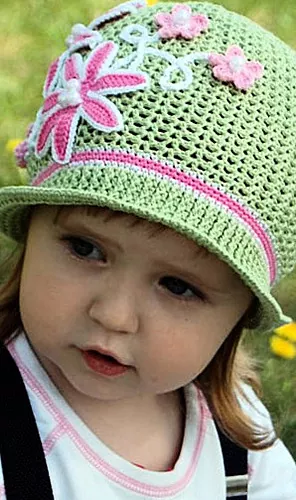 Topi rajutan untuk anak perempuan. Pilihan model dan pola rajutan