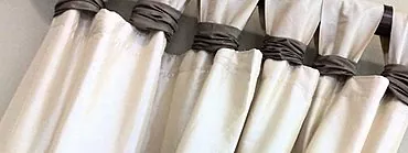 Com penjar la barra de cortina i triar-la segons el tipus de cortina?