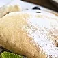 Bagaimana cara memanggang pancake yang lezat dengan susu asam?