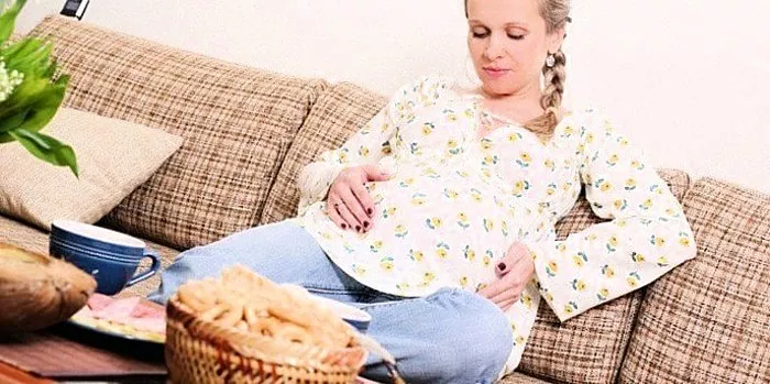 Mengapa perut sakit semasa mengandung: kemungkinan sebab dan cara untuk menghilangkannya