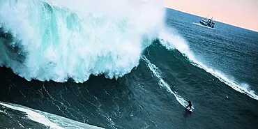 Surfando em ondas grandes: como tirar uma foto de ação com qualidade?