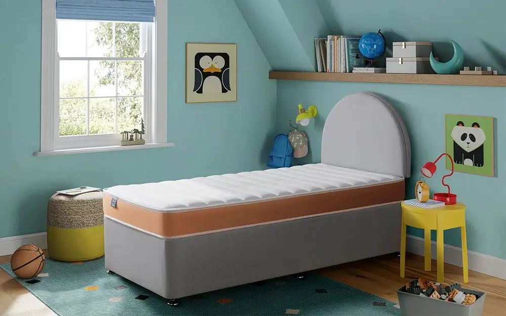The Silentnight Kids Bonnell Quilted Mattress in a children's bedroom.