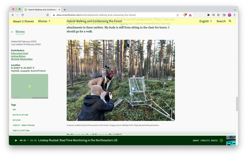 Screenshot of a logbook detail page, with a photo of people in a forest.