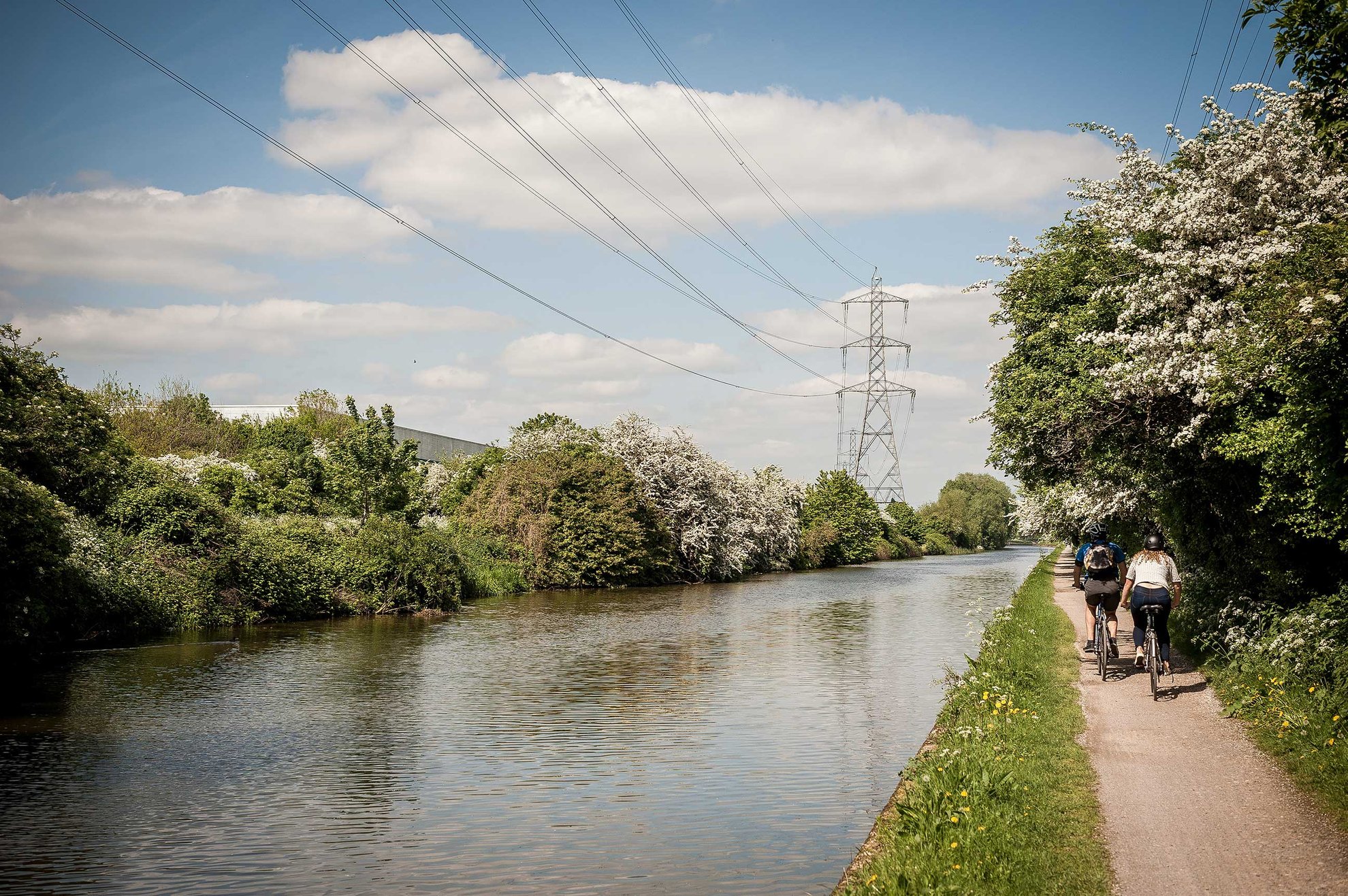 Cyclists on the tow path of the River Lea Navigation