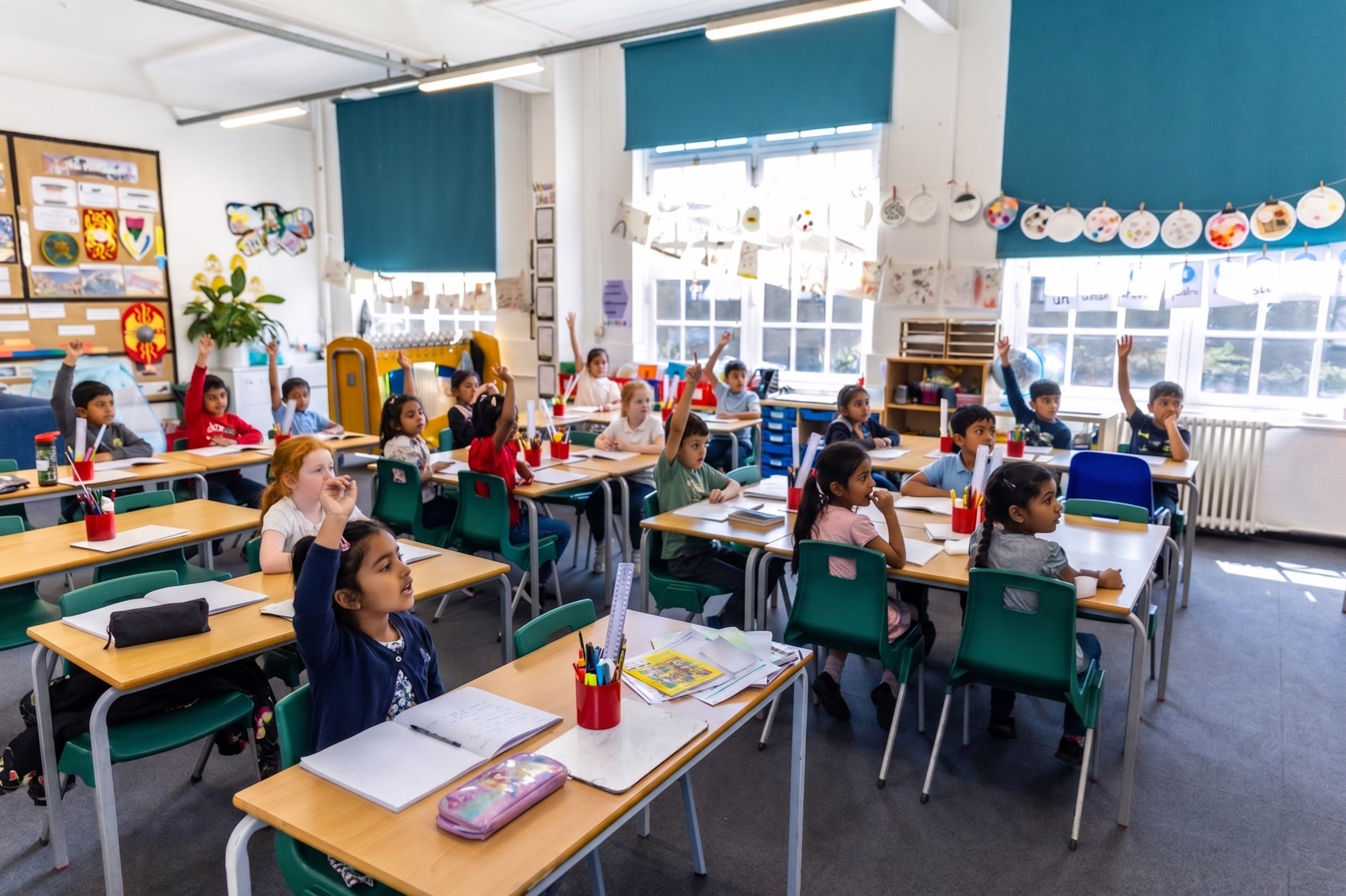 Same classroom with AI-generated pupils collaborating on a classroom activity