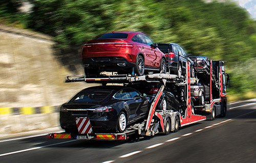 prestige cars on car transporter