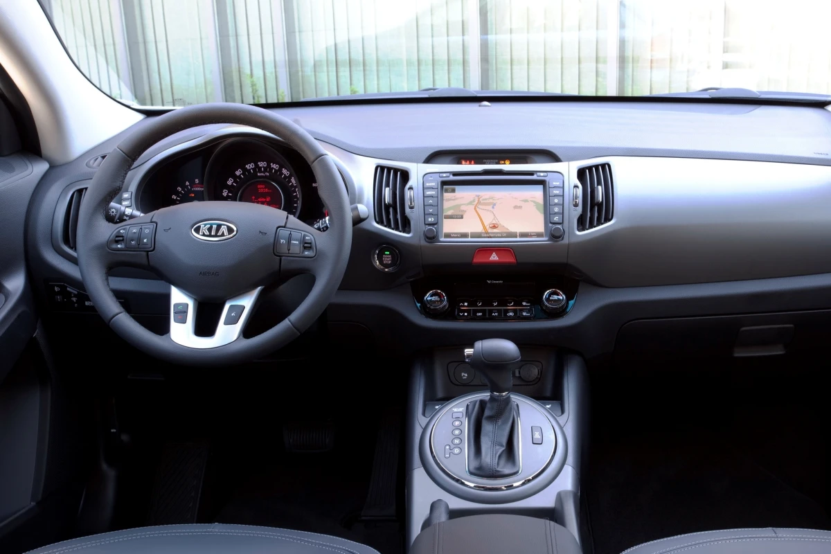 Интерьер поколения Kia Sportage III (SL) (2011–2016) — салон, комплектации и изменения для рынка Украина