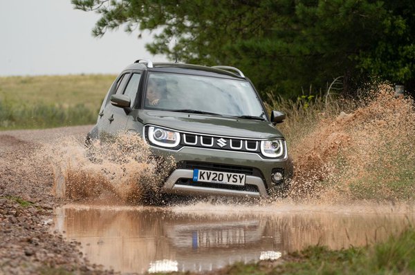 Subaru driving through deep water