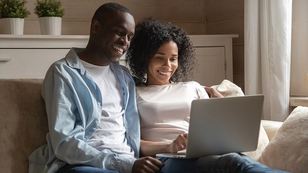 Couple relaxing on sofa