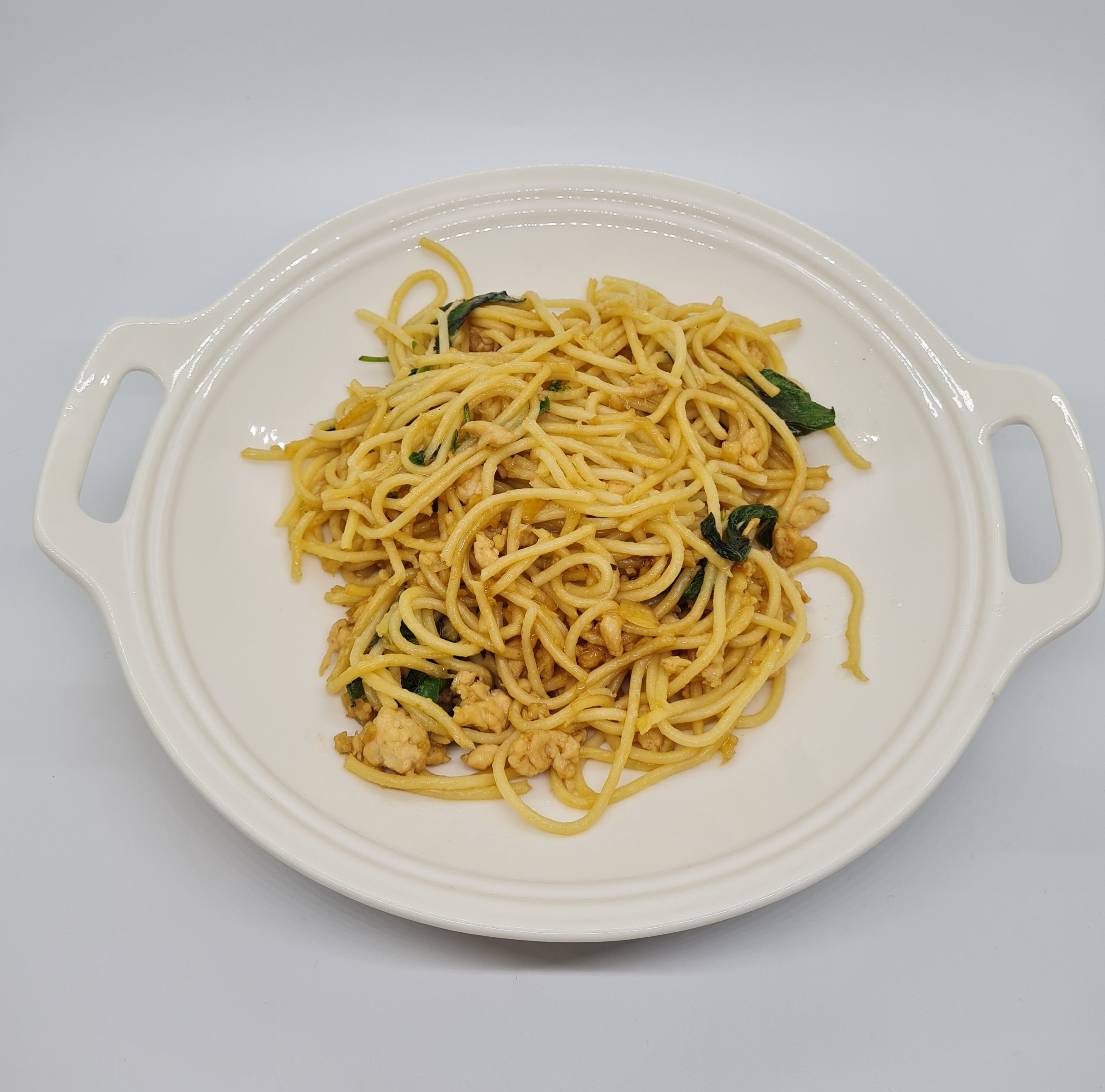 Stir Fried Chicken With Holy Basil Leaves Over Spaghetti 1