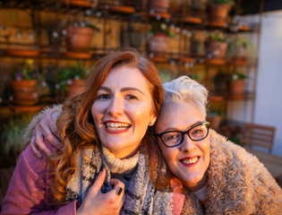 2 women smiling together