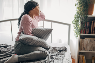 Women on the bed and looking out the women