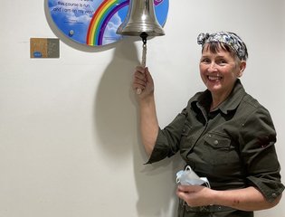 Christine Thomasson ringing the bell at Christie Hospital