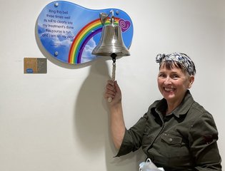 Christine Thomasson ringing the bell at Christie Hospital