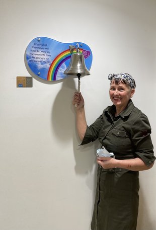 Christine Thomasson ringing the bell at Christie Hospital