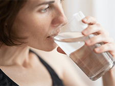 Woman drinking glass of water