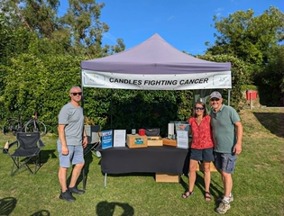 Sue and Neil (right) with candle stall